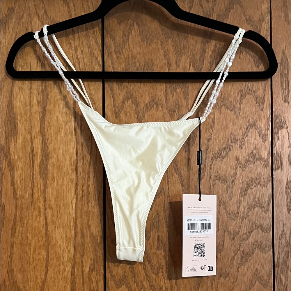 Oh Polly Cream Strappy Thong. NEVER WORN OR TRIED ON!